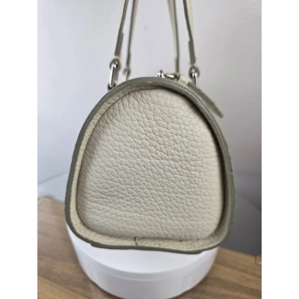 Dooney & Bourke Cream Pebbled Leather Barrel Shoulder Bag Marbled Lining